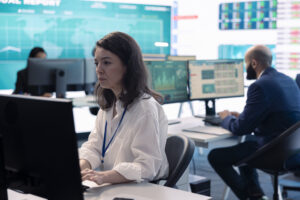 Compliance project manager examining AML risk assessment performance metrics and FSA framework indicators for Japanese financial institutions