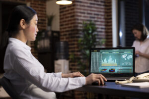 Financial analyst reviewing stablecoin AML compliance charts and regulatory obligations for issuers and distributors in Japan