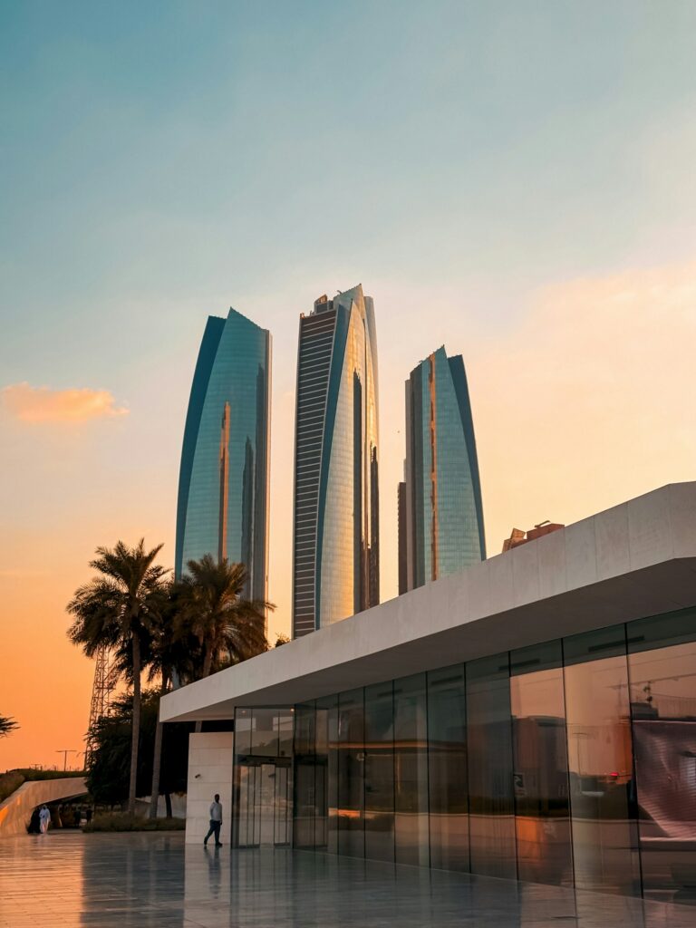 Etihad Towers in Abu Dhabi skyline representing the regulatory environment for ADGM AML compliance in the UAE financial sector