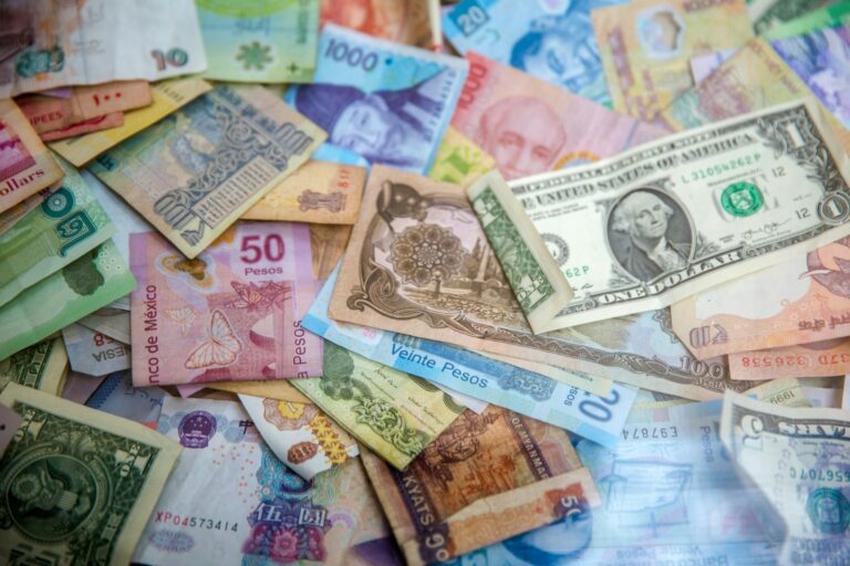 International banknotes representing hawala and alternative remittance AML compliance in the GCC region