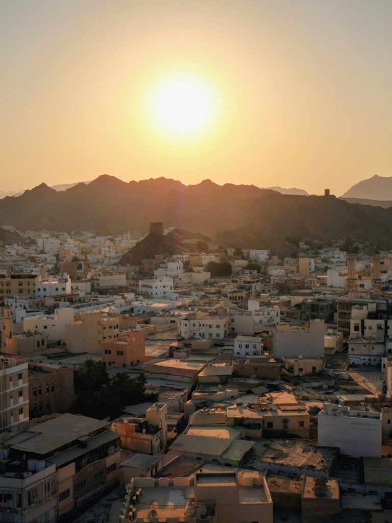 Muscat skyline representing the regulatory environment for CBO AML compliance in Oman