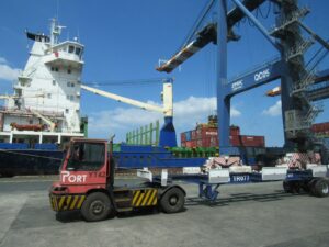 Cargo screening at port representing sanctions and export control compliance for Gulf financial institutions