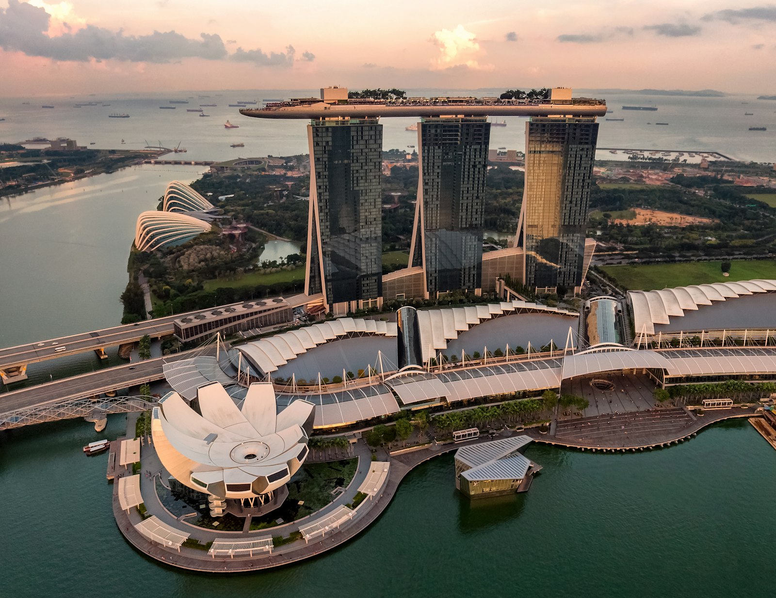 Aerial dusk view of the Marina Bay skyline and modern glass towers in Singapore, representing the regulatory environment for MAS AML/CFT compliance