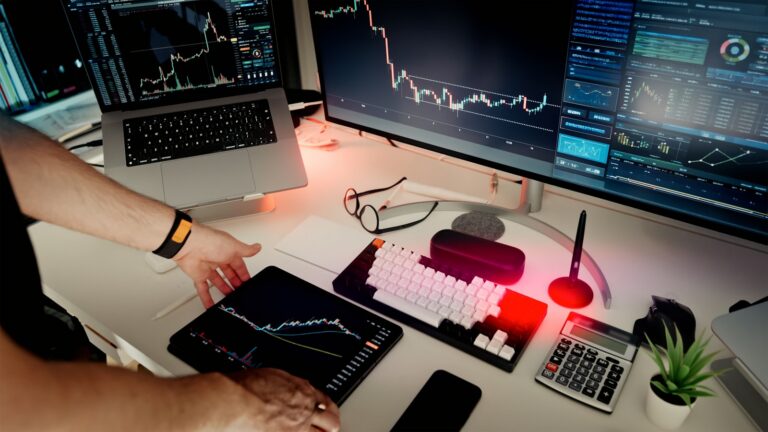 Modern financial technology workspace representing virtual asset and cryptocurrency regulation in the UAE and Saudi Arabia